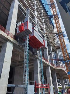 SCE400G Passenger Material Hoist , with double mast section and electrical rolling door For Construction